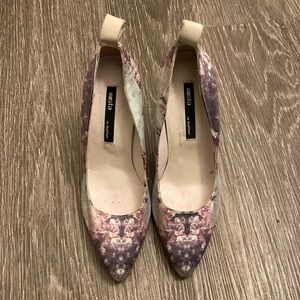 Artsy prints combined with a 3 colored acrylic heels.